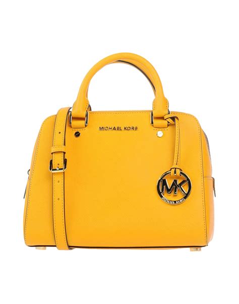 yellow and tan michael kors purse|yellow michael kors backpack.